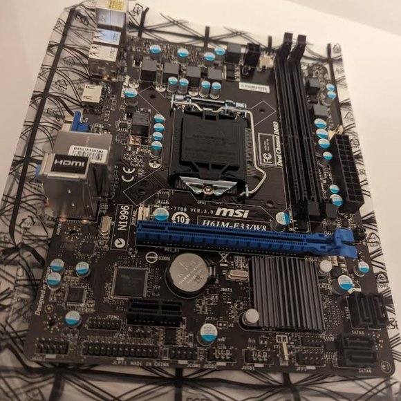 New in box MSI H61M-E33/W8 Motherboard - Picture 7 of 8